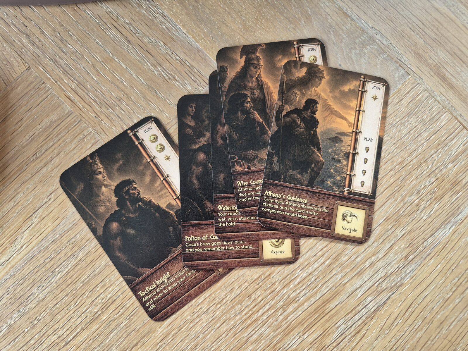 A hand of adventure cards fanned out on the table.